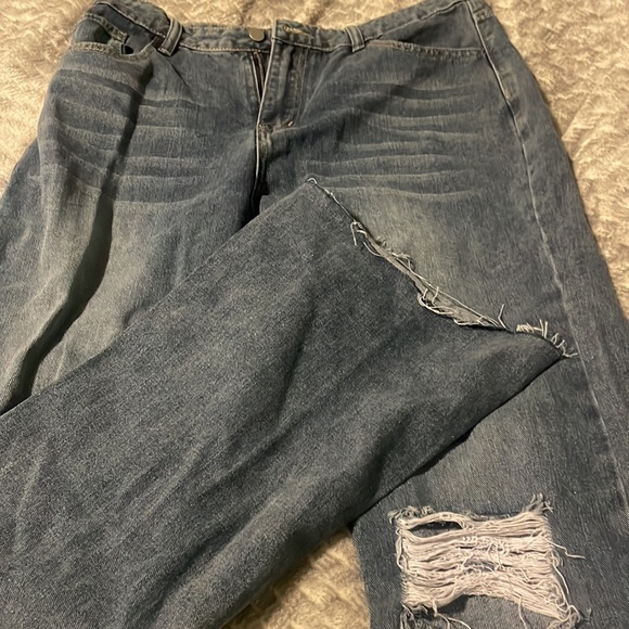 Brand new ripped jeans never worn, they were too big when I tried them on. - Picture 2 of 3